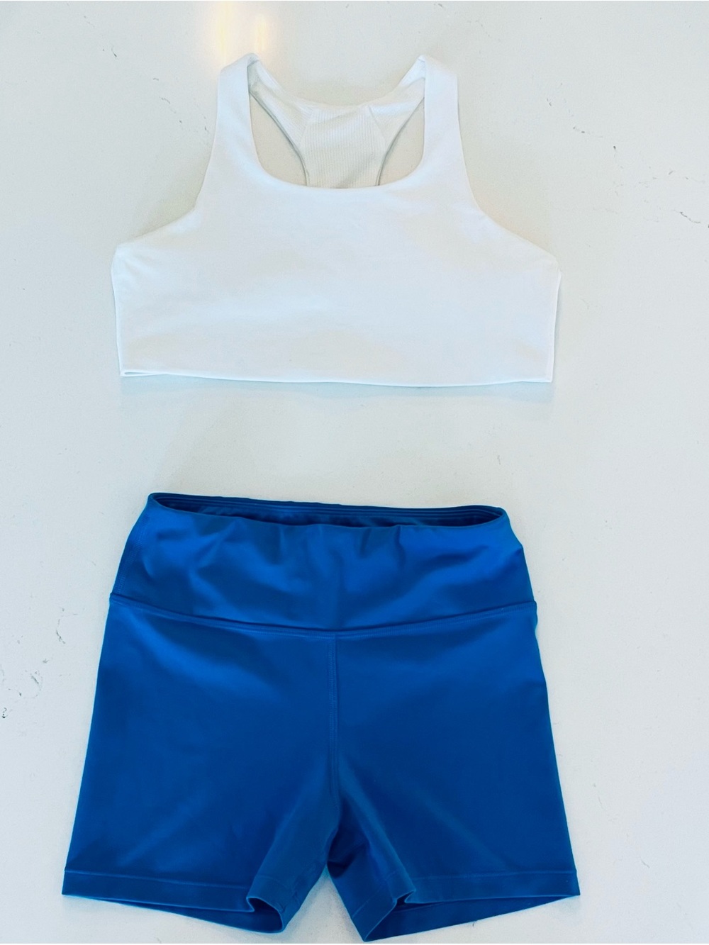 Athleta White Sports Bra and Blue Active Shorts Set